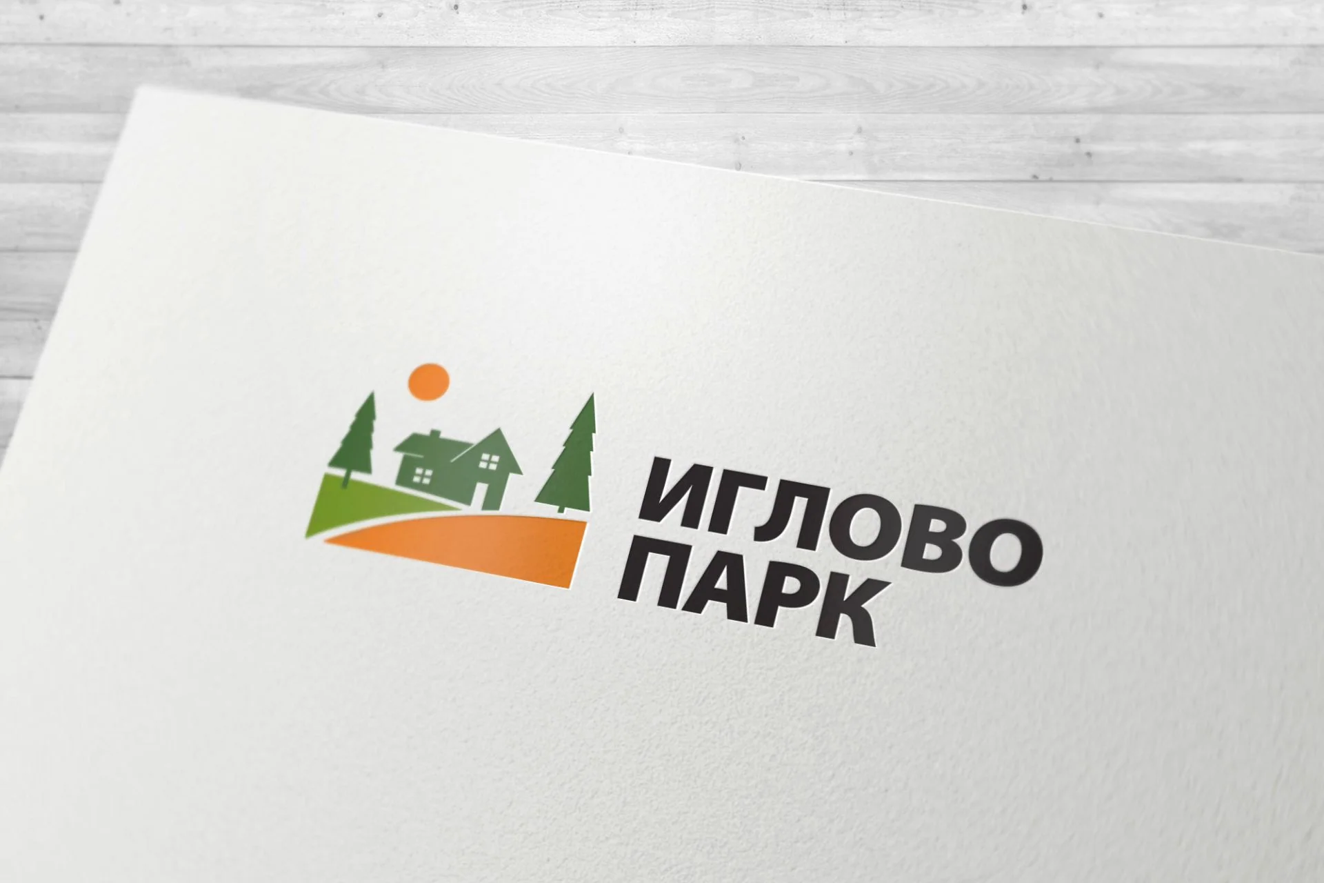 Горизонтальный логотип «Иглово парк» на бумаге